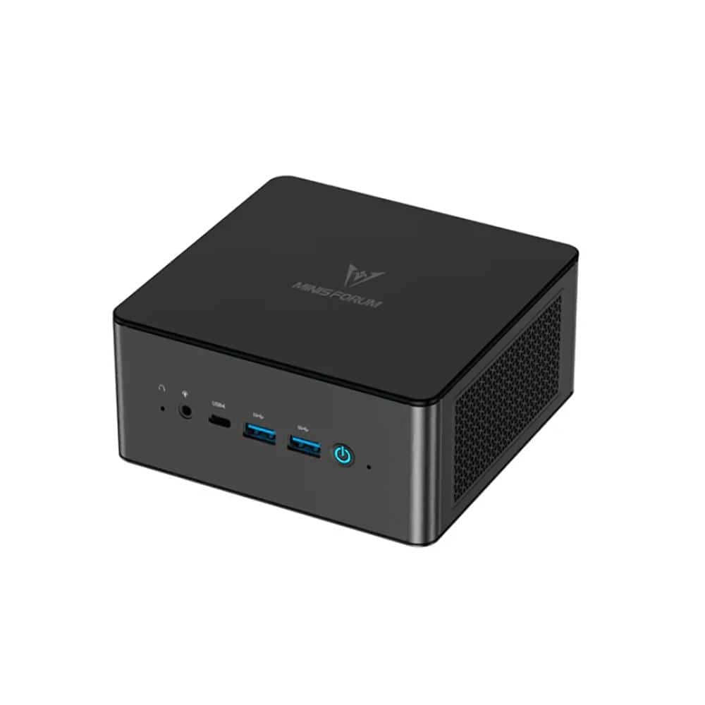 'Minisforum UM890 Pro Mini PC on a desk with multiple displays'